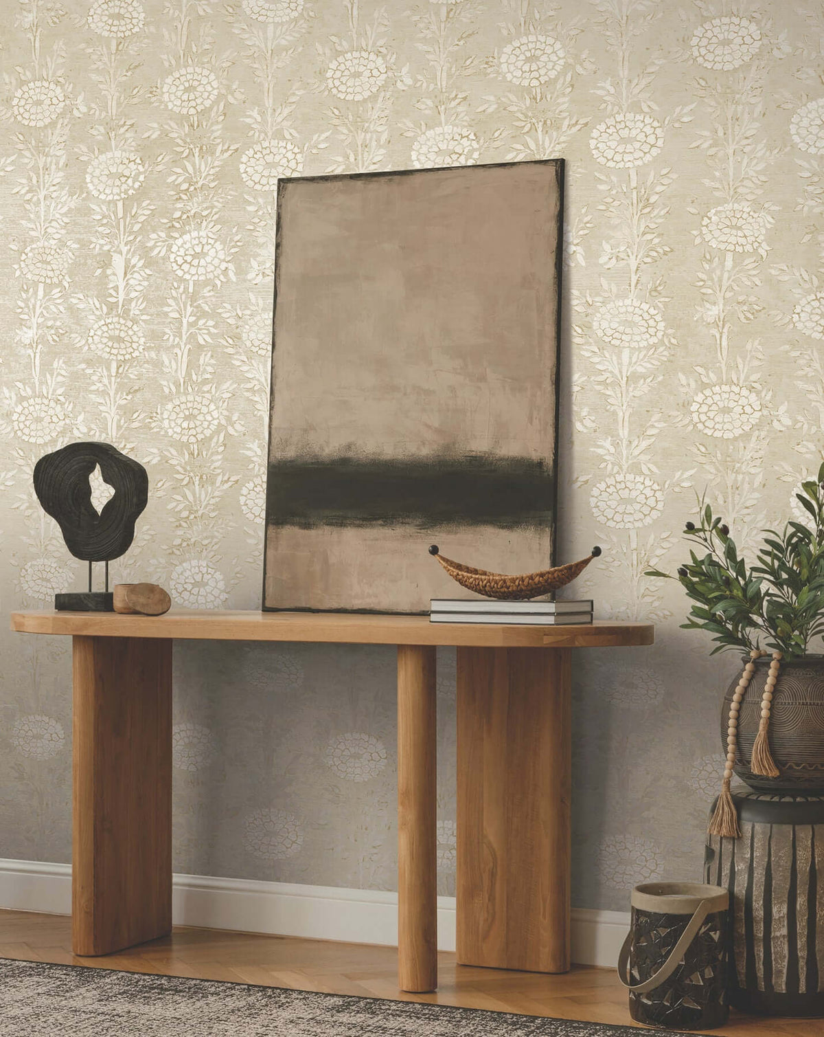 Elegant taupe and gold floral wallpaper with French marigold flowers and shimmering metallic details. A refined botanical wallcovering for luxury bedrooms, dining rooms, living spaces, and powder rooms.