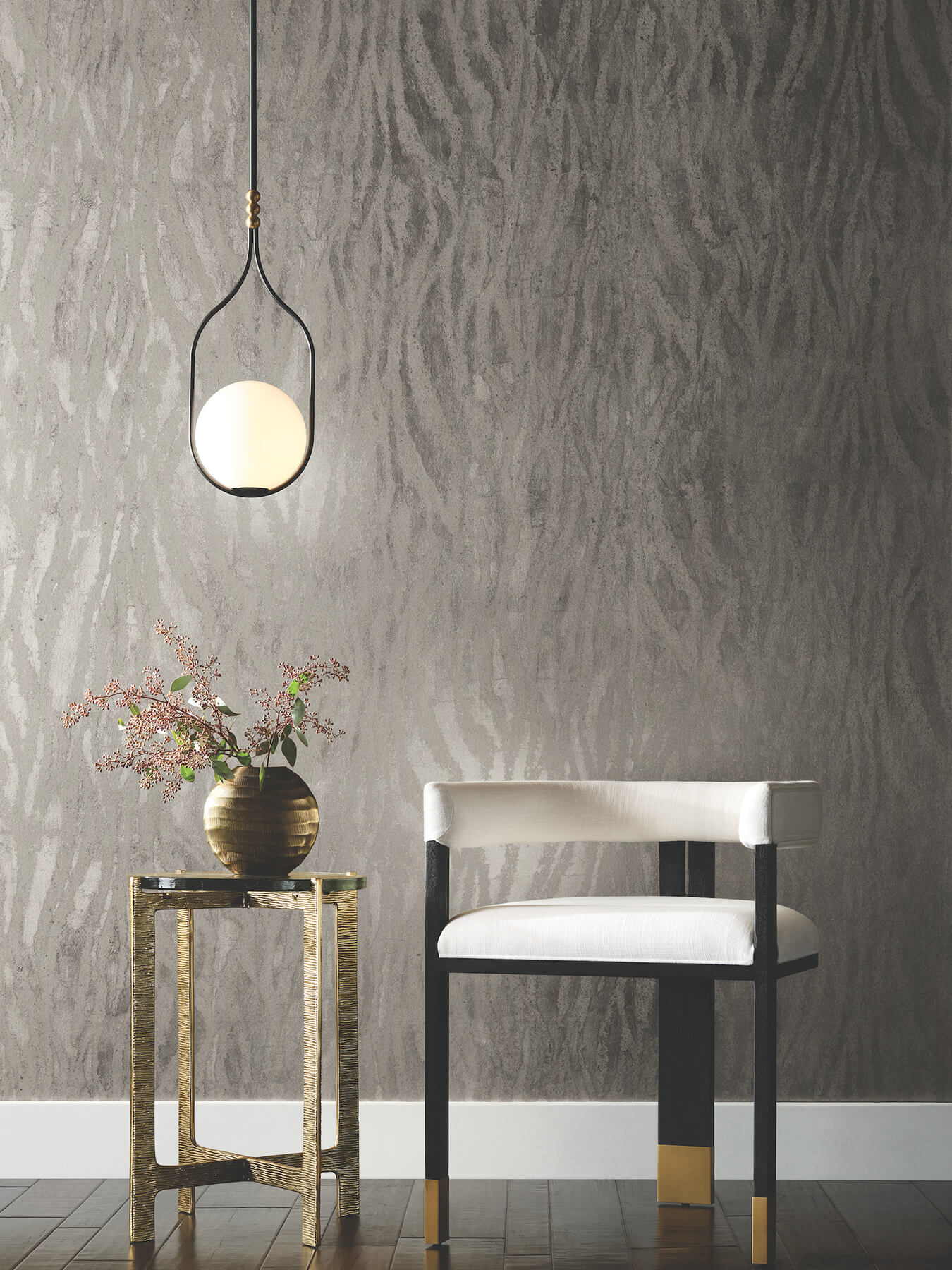 Luxury Zebra Chic Silver Wallpaper by Candice Olson featuring a sophisticated metallic zebra-inspired animal print design with shimmering silver foil accents. Modern designer wallcovering on non-woven material ideal for luxury living rooms, elegant bedrooms, dining rooms, powder rooms, accent walls, contemporary interiors, glam decor, upscale home renovation projects, statement walls, metallic wall coverings, designer wallpaper installations, and high-end residential interiors. This silver animal print wall