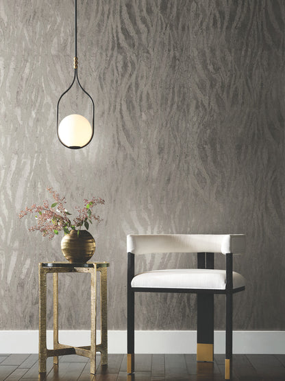 Luxury Zebra Chic Silver Wallpaper by Candice Olson featuring a sophisticated metallic zebra-inspired animal print design with shimmering silver foil accents. Modern designer wallcovering on non-woven material ideal for luxury living rooms, elegant bedrooms, dining rooms, powder rooms, accent walls, contemporary interiors, glam decor, upscale home renovation projects, statement walls, metallic wall coverings, designer wallpaper installations, and high-end residential interiors. This silver animal print wall