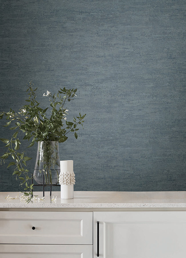 Weathered Stucco Dusty Blue wallpaper by York Wallcoverings — textured, washable vinyl wallcovering for coastal or rustic interior design.