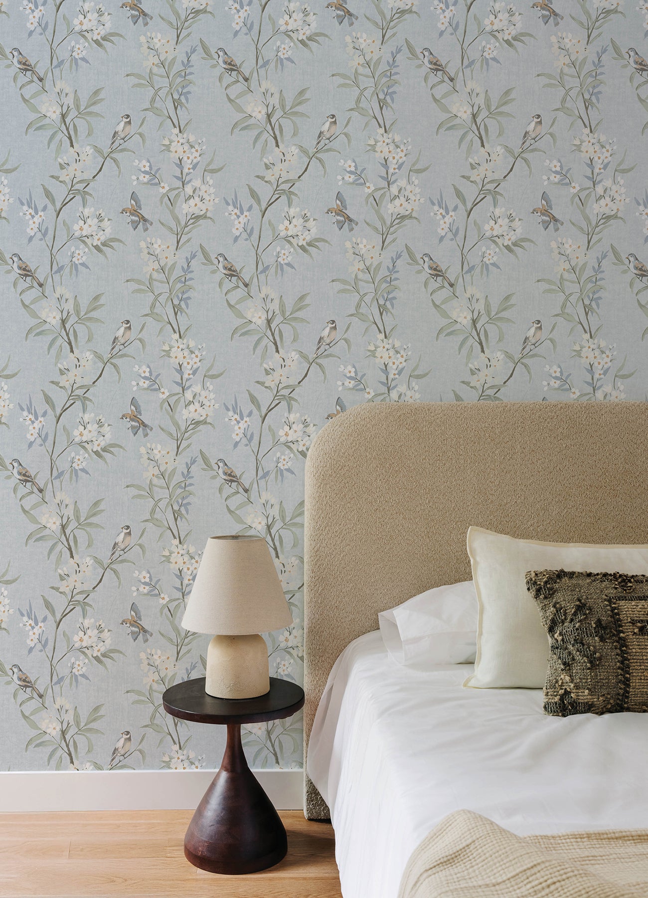 York Wallcoverings Chesapeake Tea Olive Light Blue Finch wallpaper, botanical bird pattern wallcovering in soft tea olive and light blue, designer wallpaper for nursery, living room, bedroom, or accent wall, whimsical nature-inspired décor for cottage, coastal, modern, or traditional interiors.