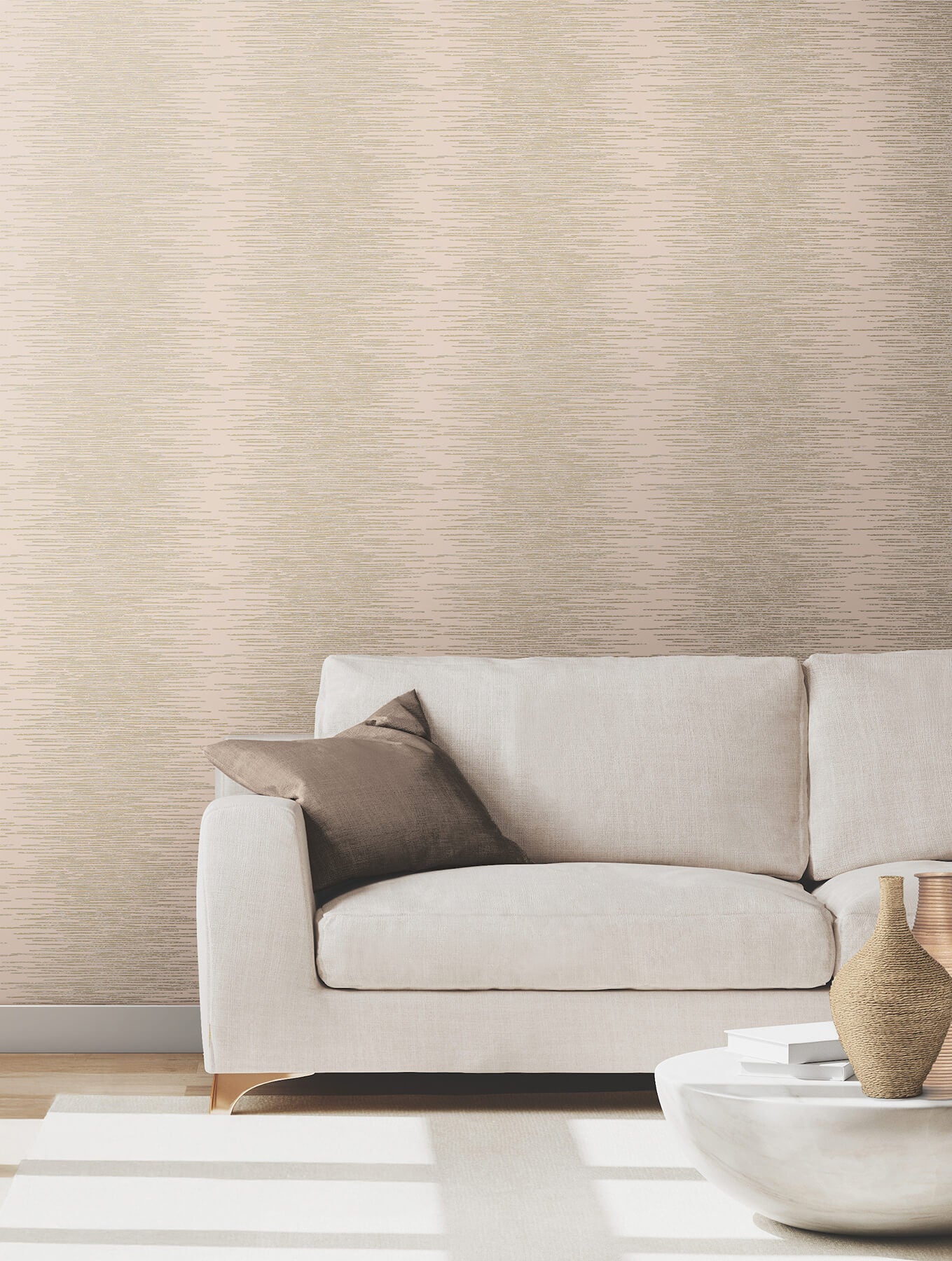Operetta Blush Metallic Columns Wallpaper by Ronald Redding featuring organic vertical metallic gold, grey, and white layered columns on a soft blush background. This modern luxury non-woven wallpaper adds elegant texture and subtle shimmer to living rooms, bedrooms, dining rooms, offices, powder rooms, and feature walls. Washable, strippable designer wallcovering for contemporary, glam, and transitional interior design.