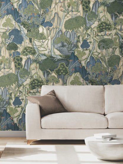 Falling Waters Sapphire scenic wallpaper by Ronald Redding for York Wallcoverings featuring illustrated mountains, cascading waterfalls, and lush trees in rich sapphire blue and green jewel tones with cream and crimson accents, luxury scenic landscape wallcovering for living rooms, dining rooms, bedrooms, statement walls, and classic interior design.