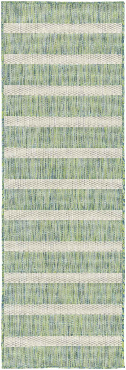 Woven green and cream striped runner rug with textured surface and mint-green tones
