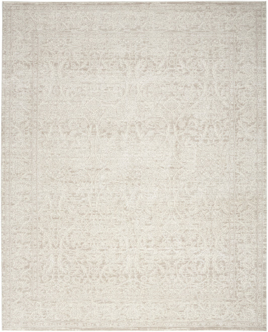 Cream-toned area rug with a faint vintage oriental pattern and subtle border, woven texture.
