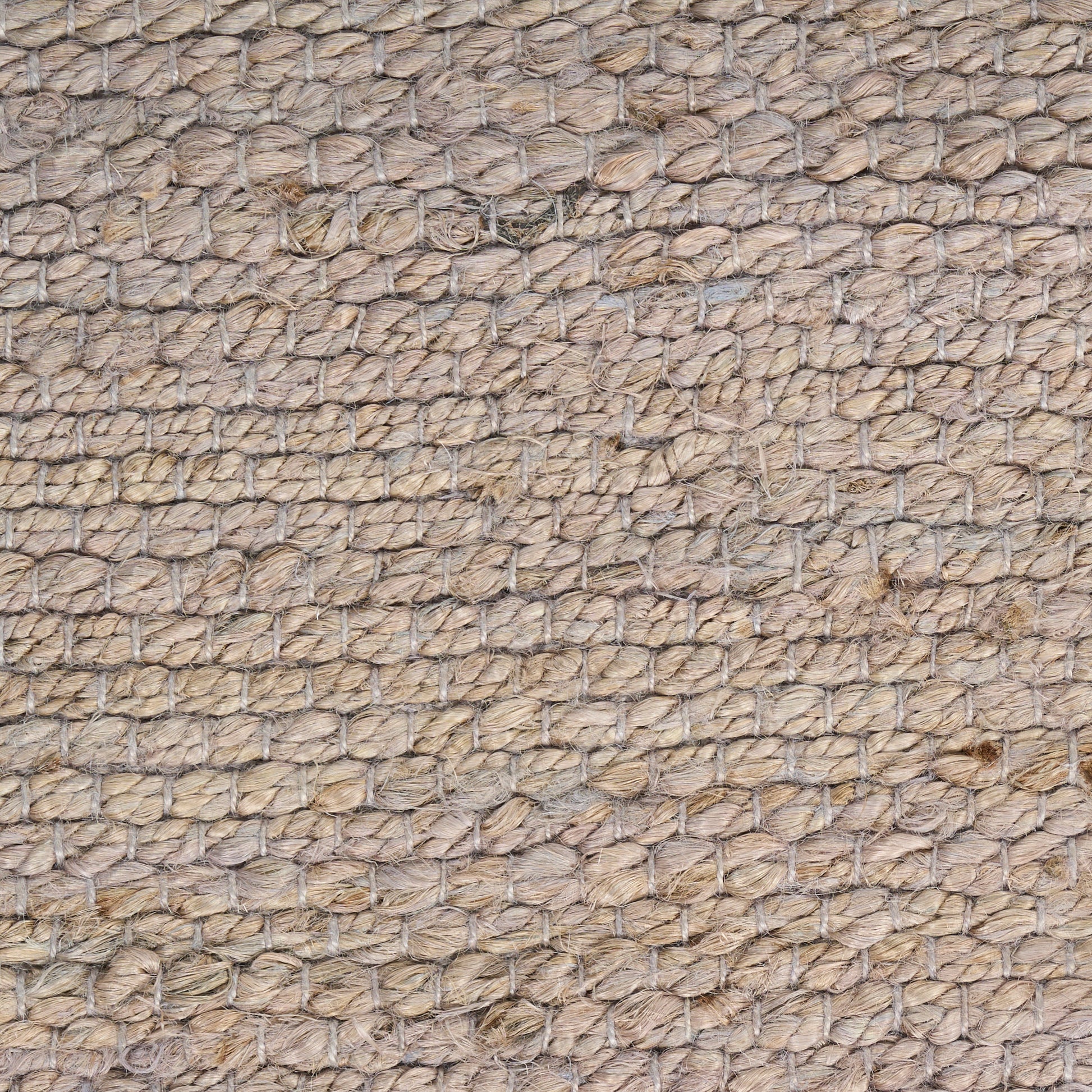 Natural beige jute weave with rope-like loops; rustic textured rug.