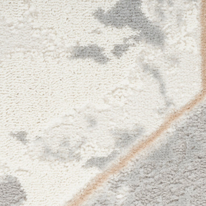 Cream & gray abstract patterned rug with a beige diagonal stripe & plush high pile.