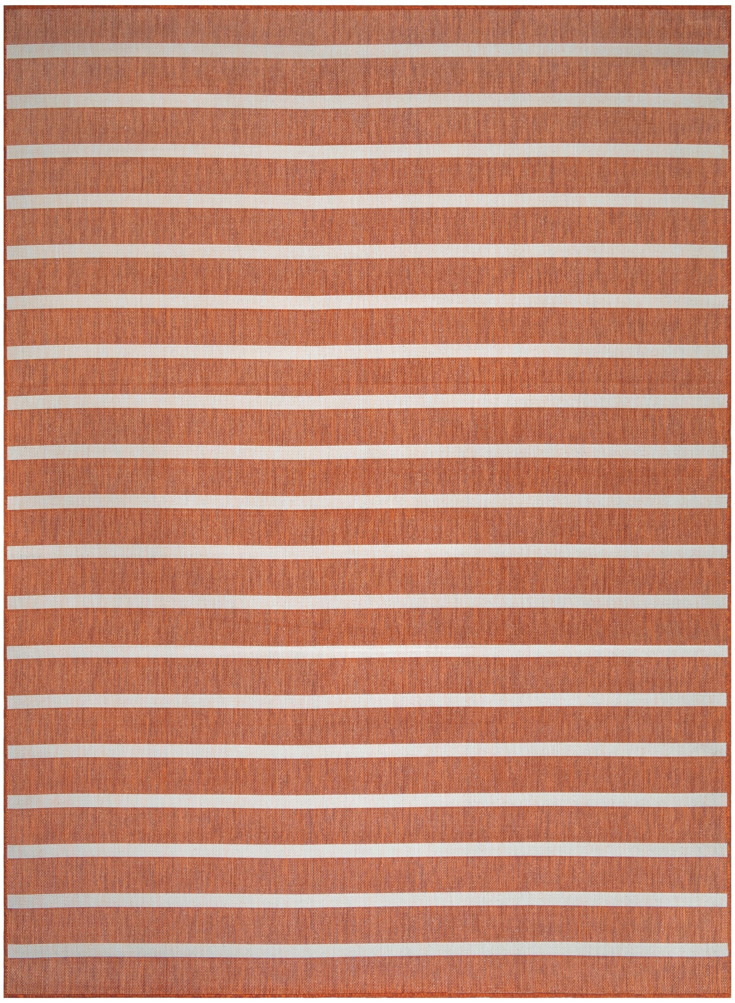 Burnt orange woven rug with white horizontal stripes; textured floor mat.