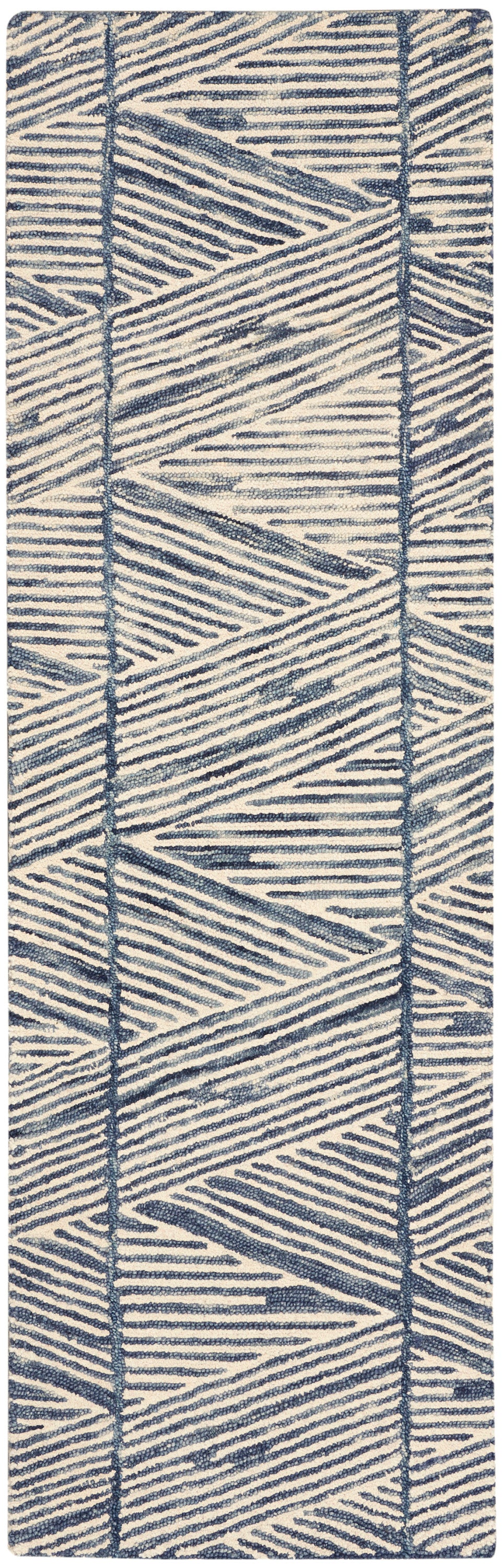 Navy blue geometric woven rug runner on ivory, textured chevron pattern.
