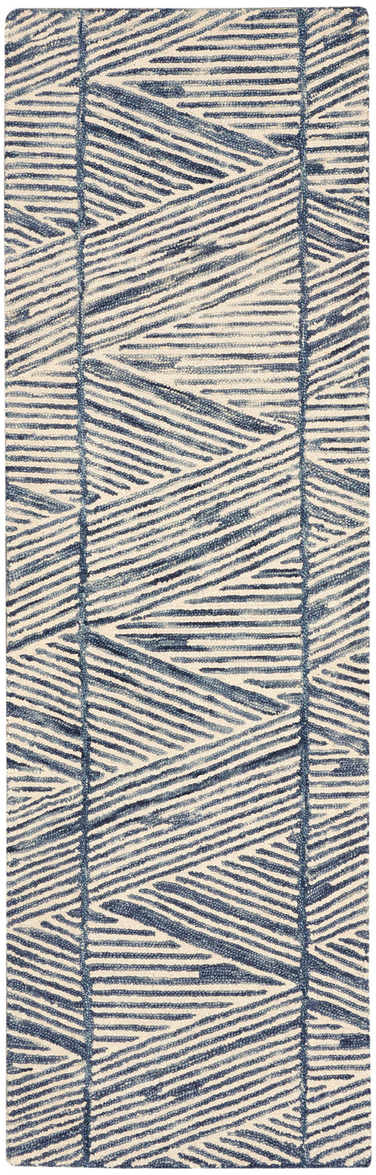 Navy blue geometric woven rug runner on ivory, textured chevron pattern.