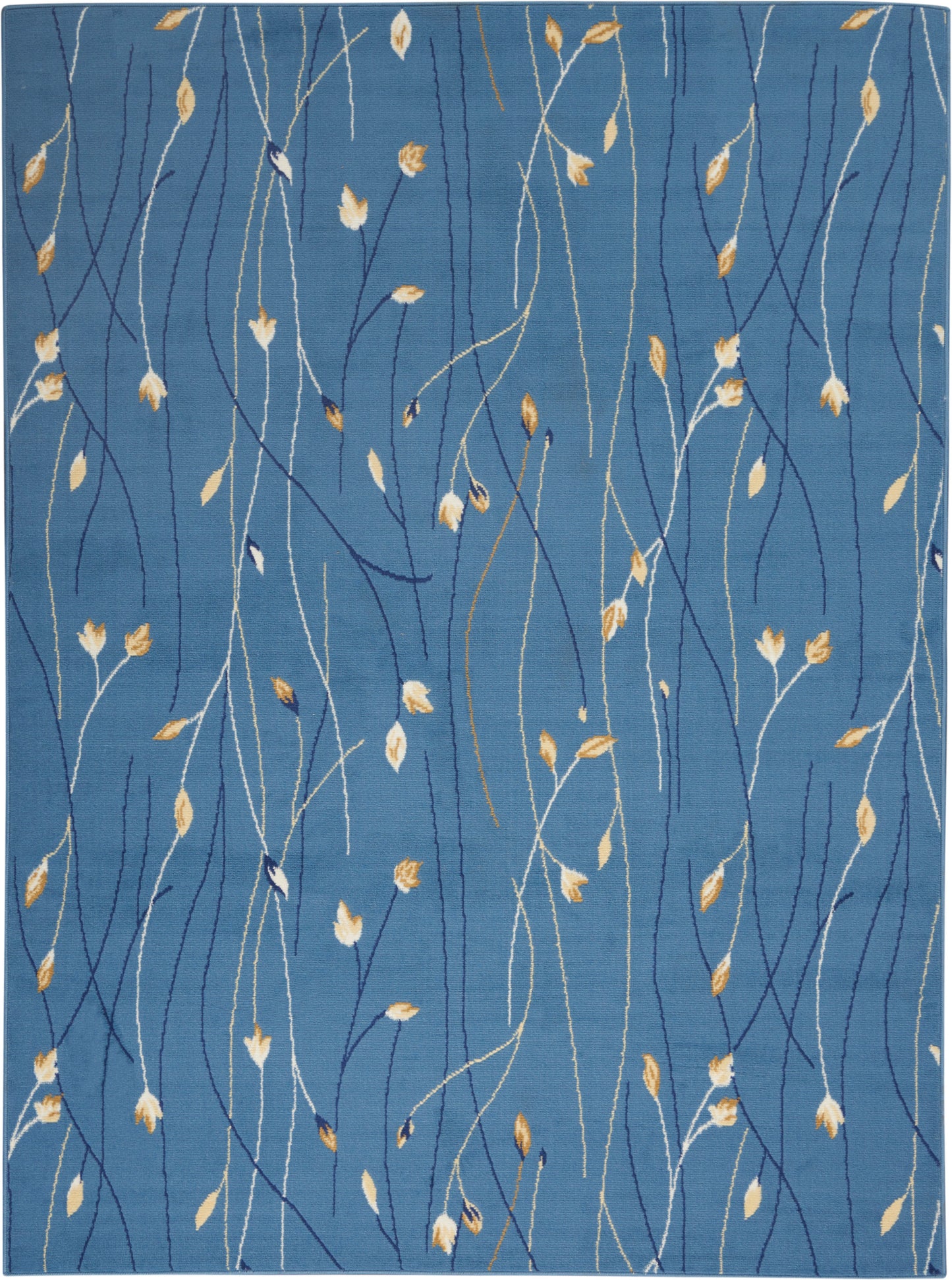 Blue area rug with white & navy vine-like lines & tan-gold leaf accents.