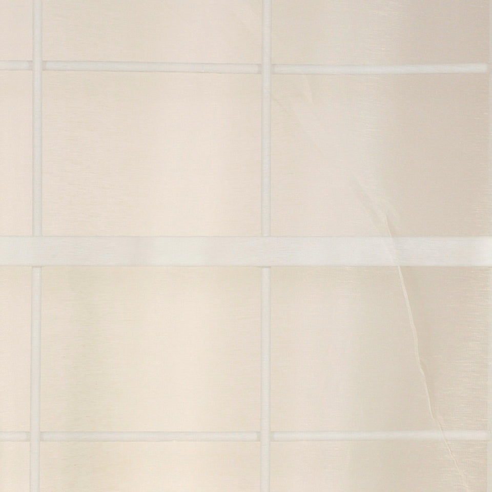 Cream drapery fabric with a subtle texture.