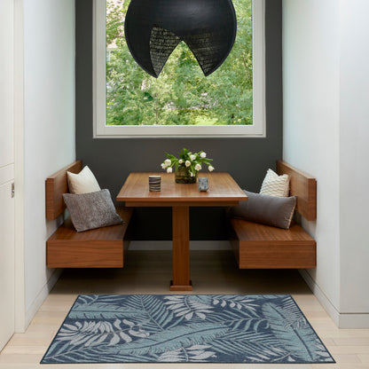Blue tropical-pattern rug, 3' x 5'.
