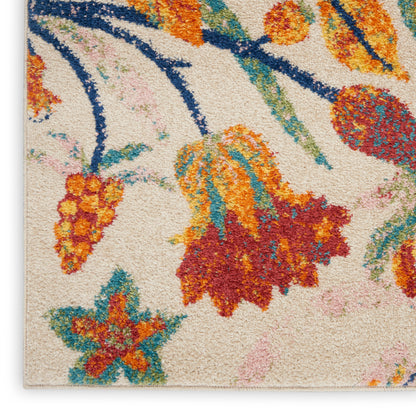 Floral shag rug with bright orange, red and teal blooms on cream background; textured, cozy decor.