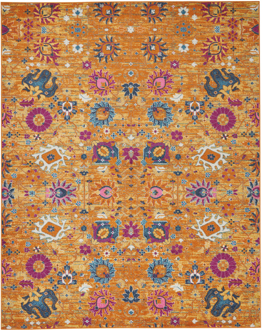 Bright orange Bohemian rug, 9' x 12', featuring blue, pink and purple floral medallions and an intricate pattern.