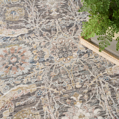Gray, ivory, blue and gold oriental rug with floral medallion; vintage-style, soft textured pile for living rooms.