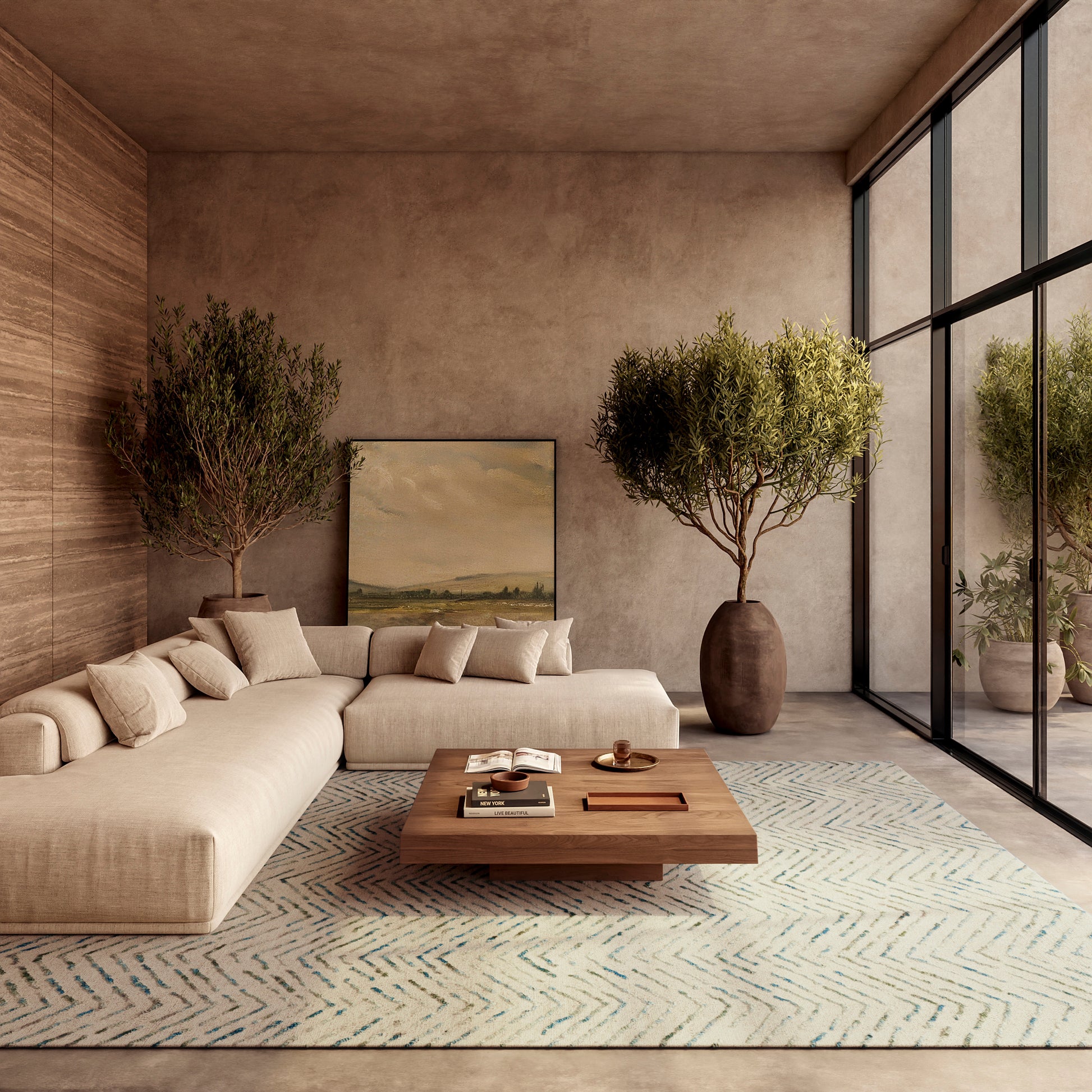 Beige L-shaped fabric sofa, cream cushions, wooden coffee table, pale chevron rug, potted trees, warm modern living room.