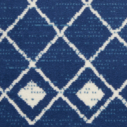 Blue woven rug with white diamond lattice and tiny inner diamonds.