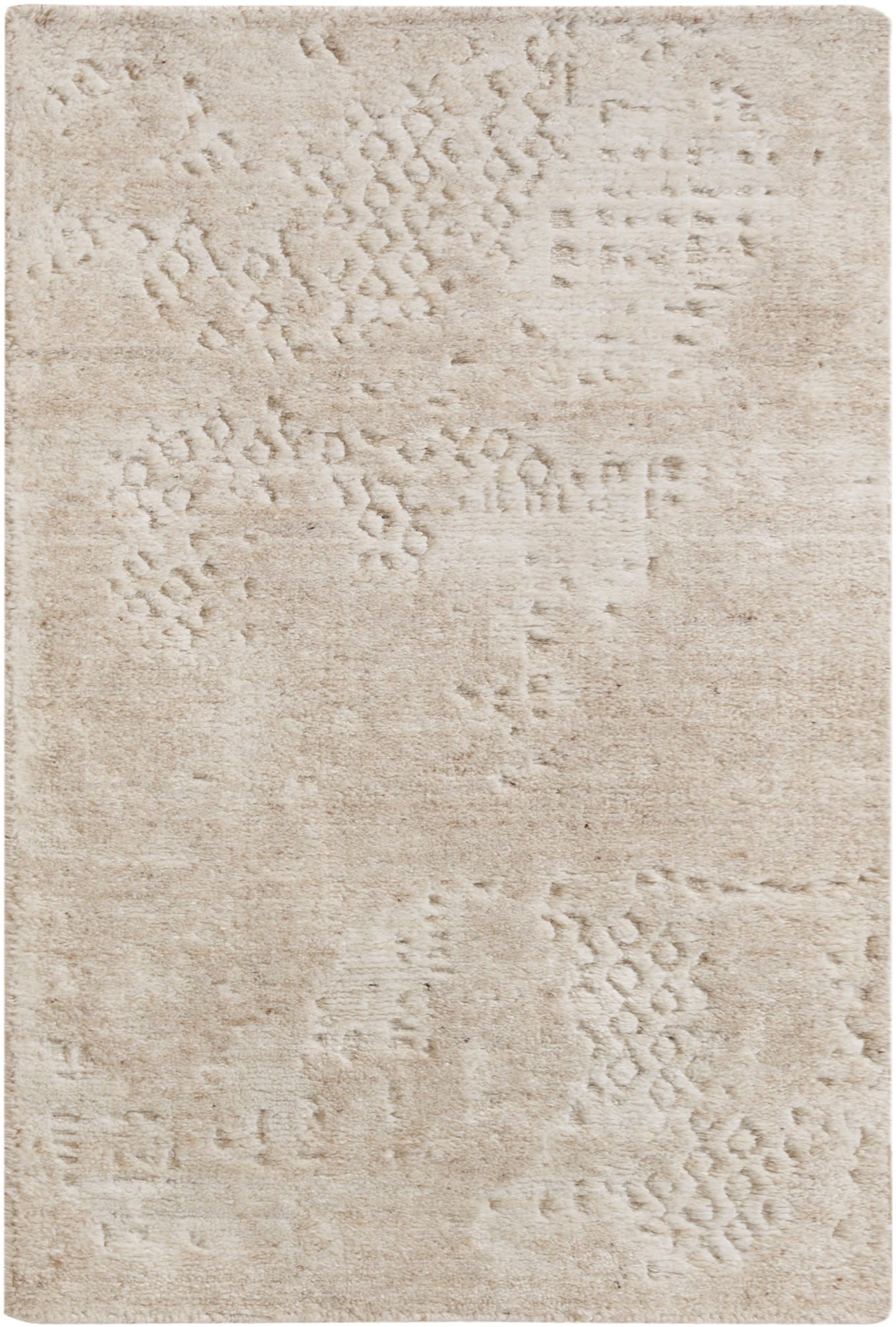 Beige rectangular rug with soft plush texture and subtle raised abstract motifs for neutral, versatile decor.