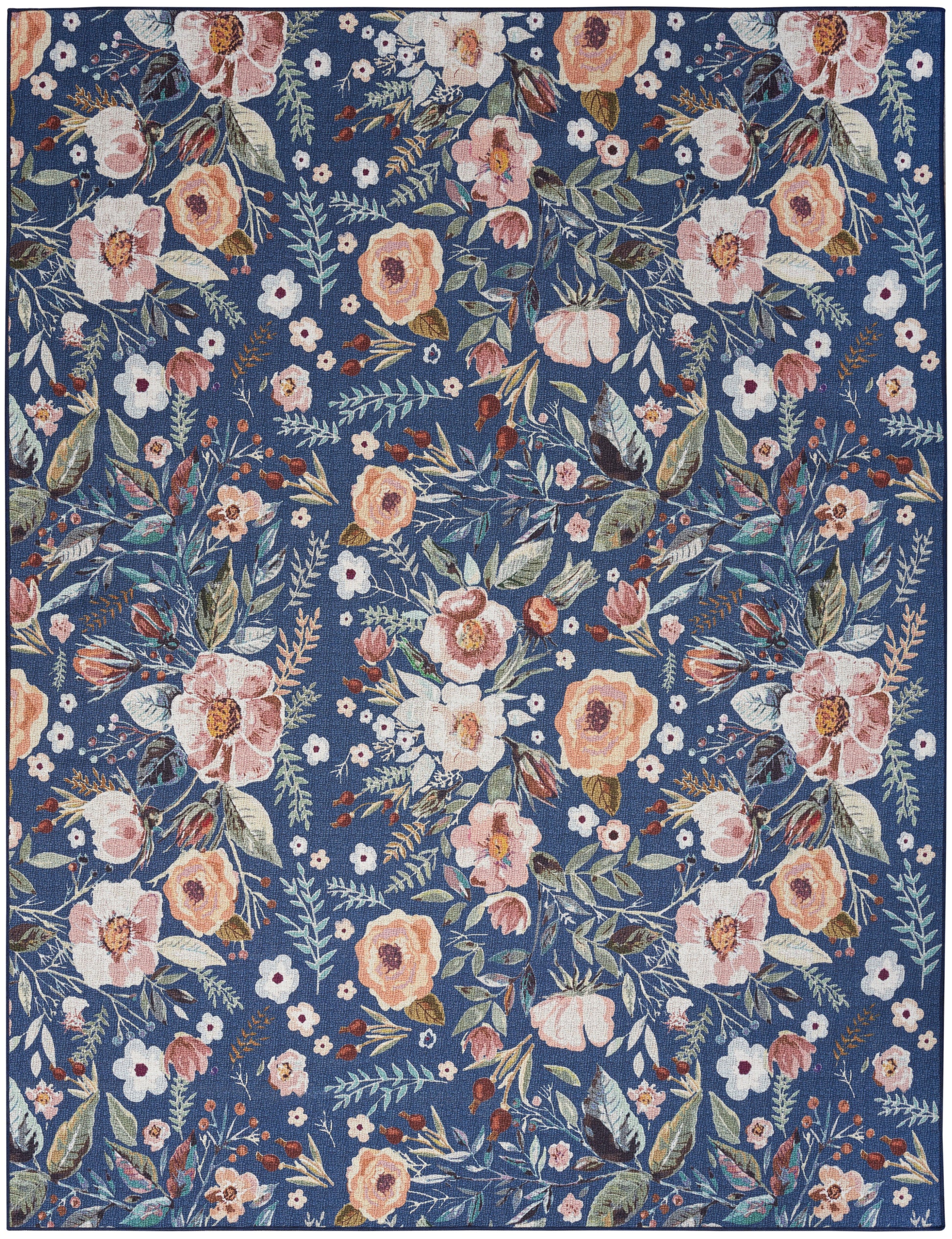 Rectangular woven rug with blue background, peach, pink and white flowers, and green leaves.