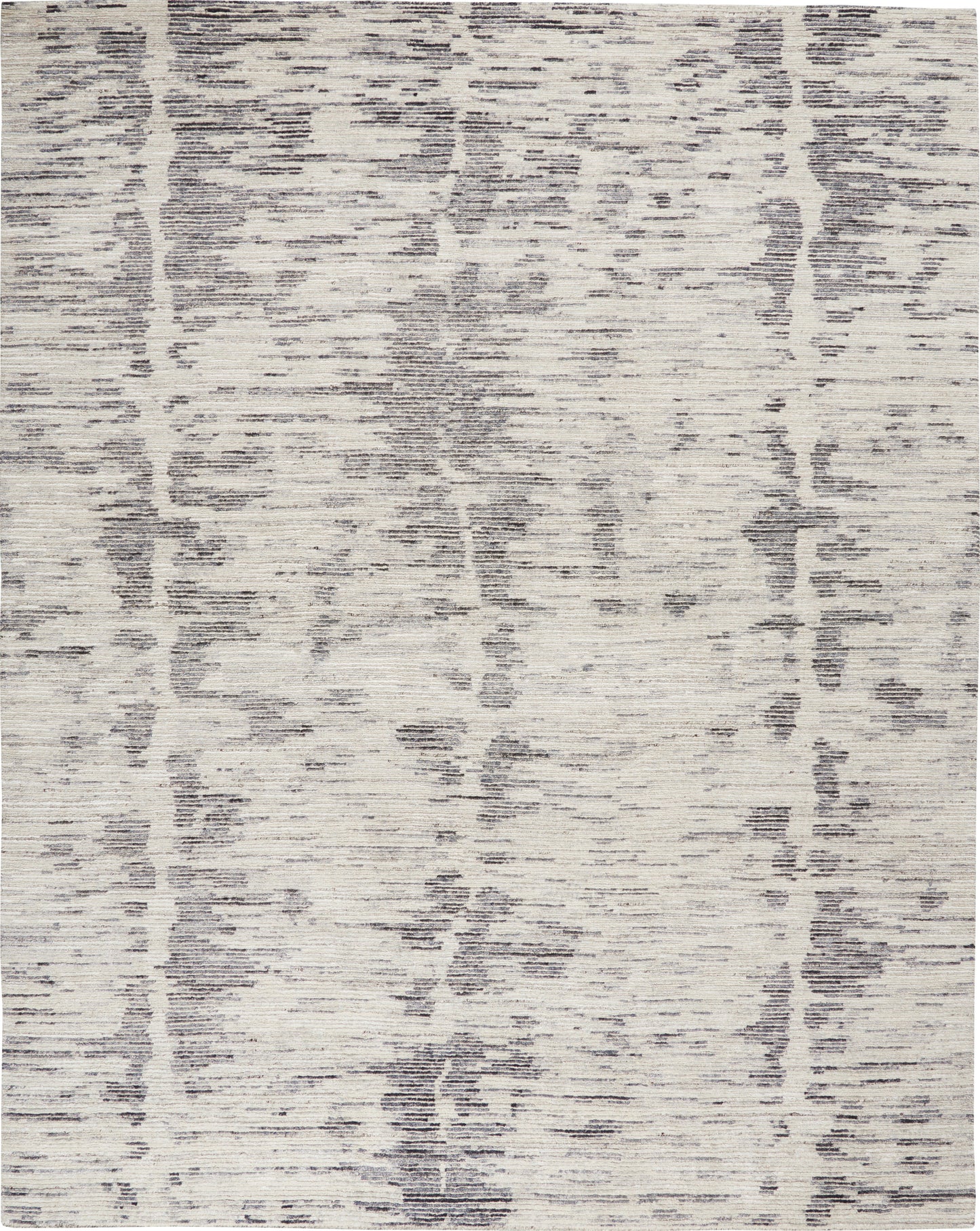 Rectangular area rug with cream base and gray distressed abstract pattern; soft, textured, modern decor.