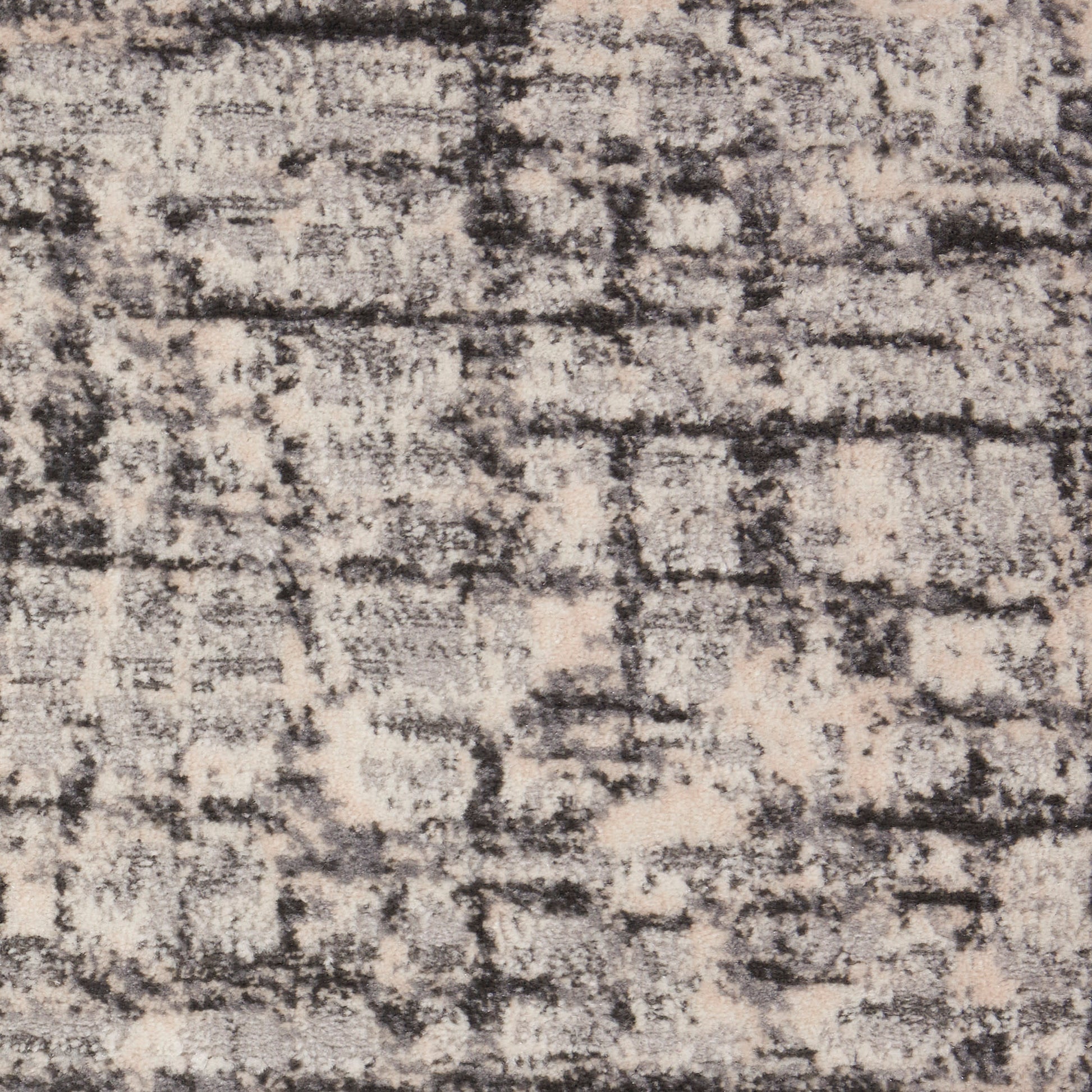 Beige & charcoal distressed abstract rug with brick-like pattern; soft, modern area rug.