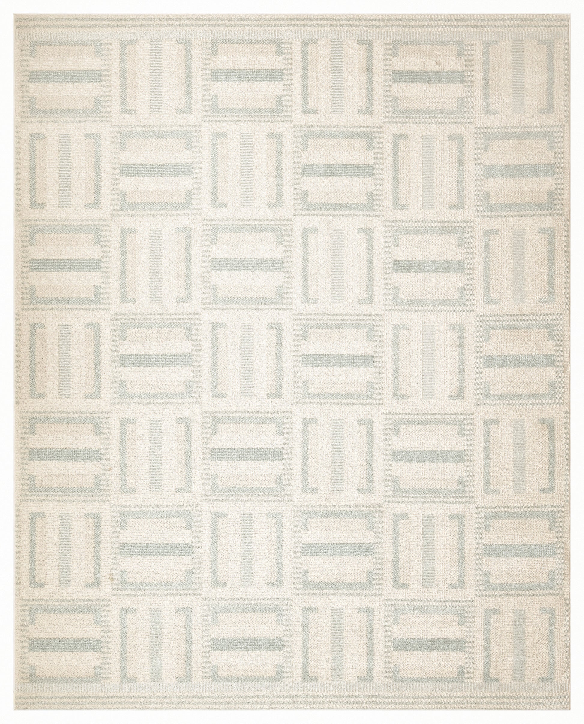Light beige woven rug with pale blue-gray tile-like blocks in a grid; modern geometric design.