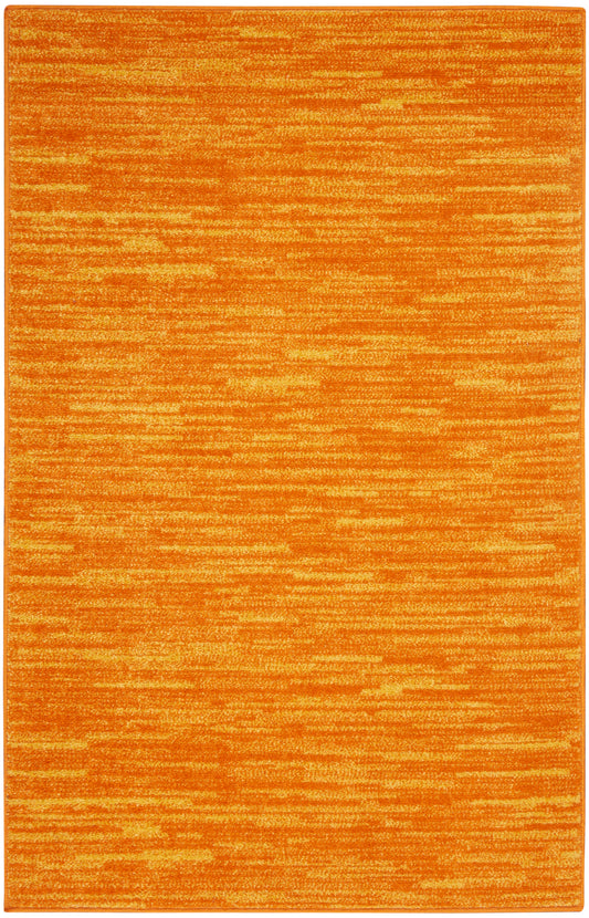 Orange textured rectangular outdoor rug with warm variegated orange tones and subtle horizontal streaks.