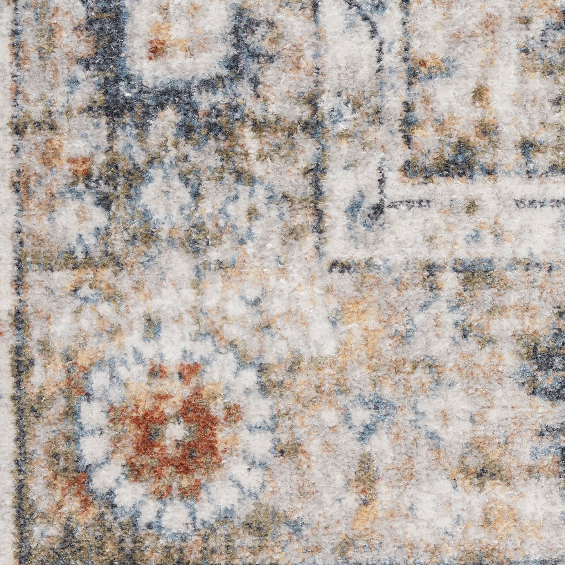 Vintage distressed area rug with ivory, blue, gray and rust floral medallions; soft textured woven pile.