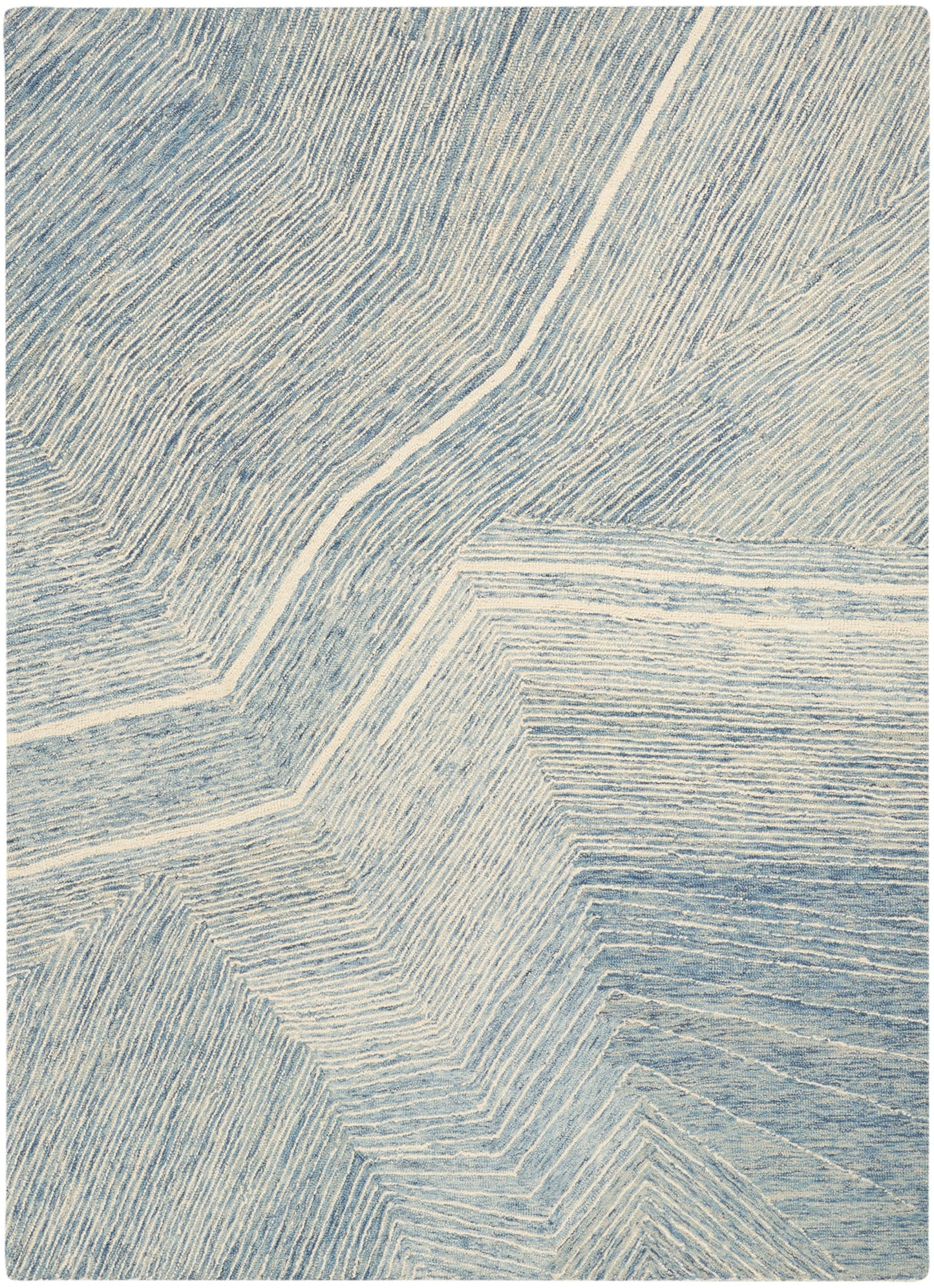 Blue & ivory geometric rug with angular chevron lines and subtle texture.