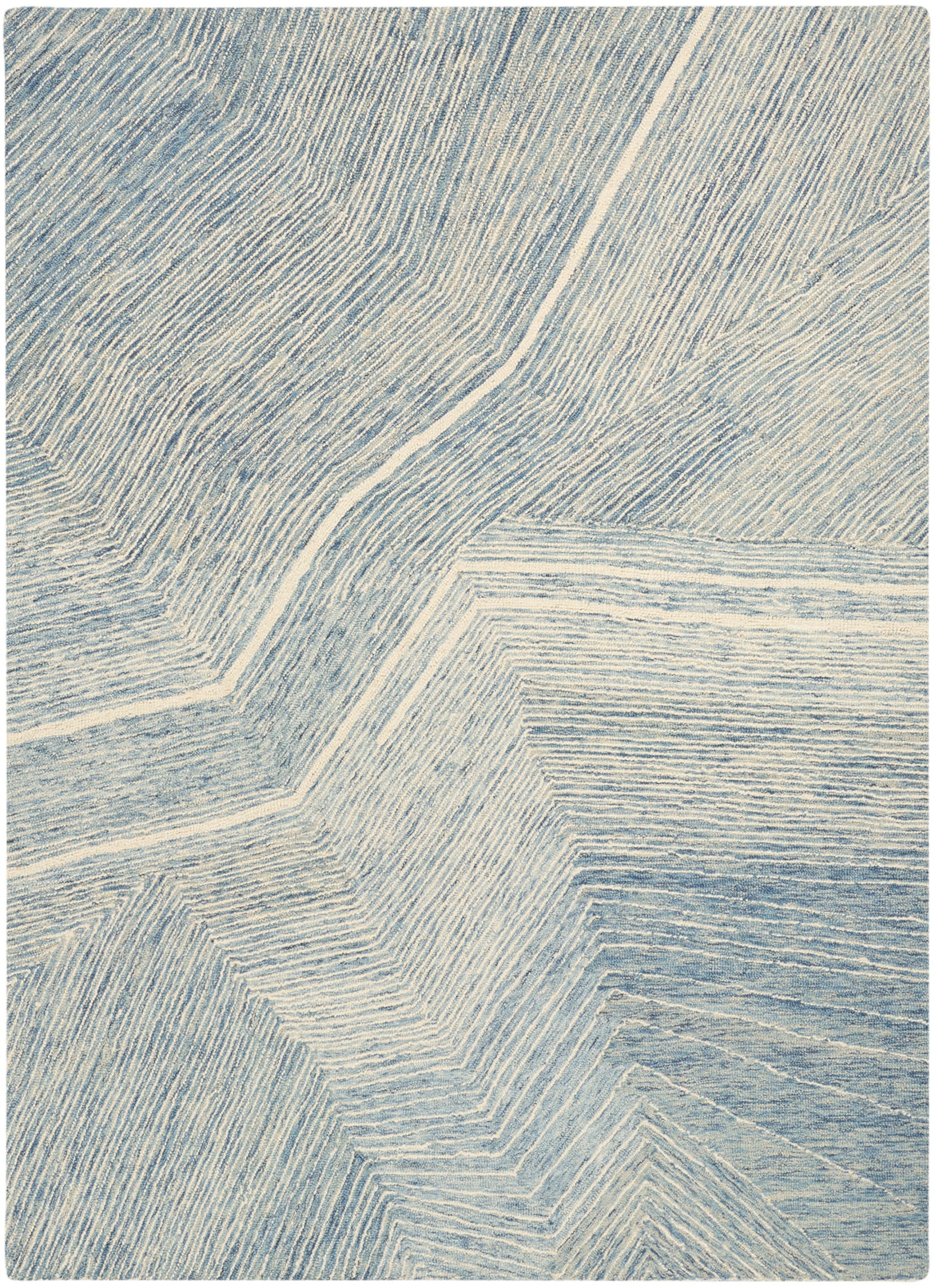 Blue & ivory geometric rug with angular chevron lines and subtle texture.