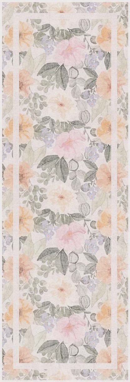 Floral runner rug with peach, pink and lavender blossoms, gray-green leaves, and pale peach borders.