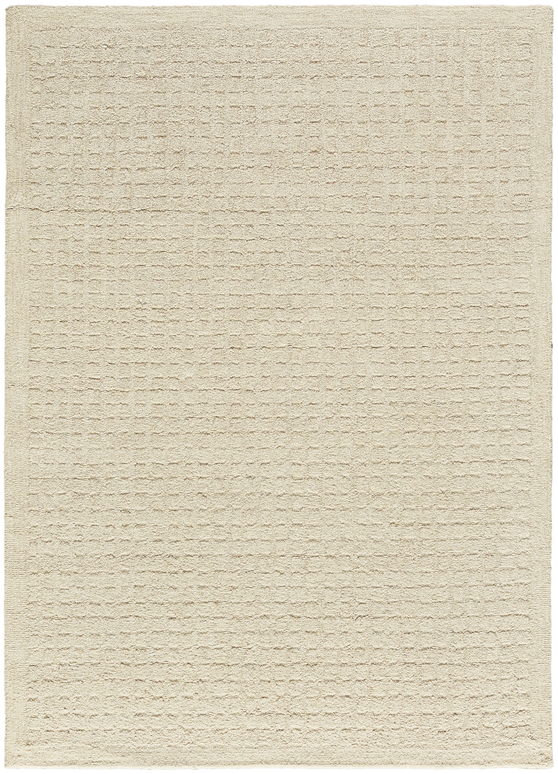 Cream textured area rug with subtle horizontal ribbing; rectangular, cozy flatweave for living spaces.