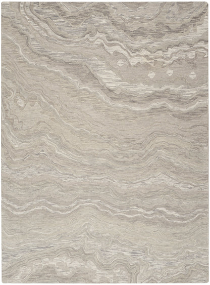 Beige taupe marbled area rug with flowing gray waves; soft woven texture for living room or bedroom decor.
