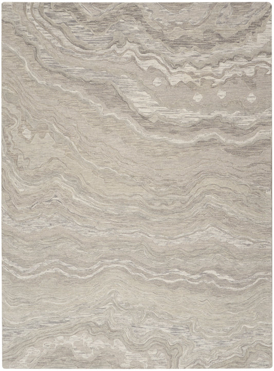 Beige taupe marbled area rug with flowing gray waves; soft woven texture for living room or bedroom decor.