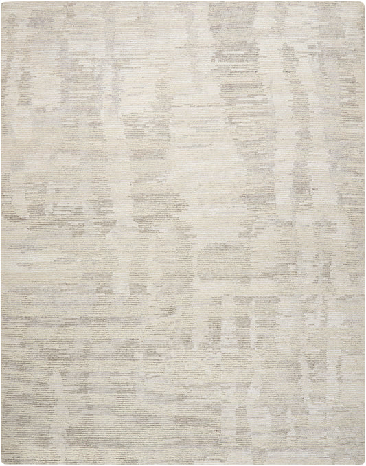 Cream textured area rug with subtle taupe abstract pattern & rectangular shape, soft woven texture for modern decor.