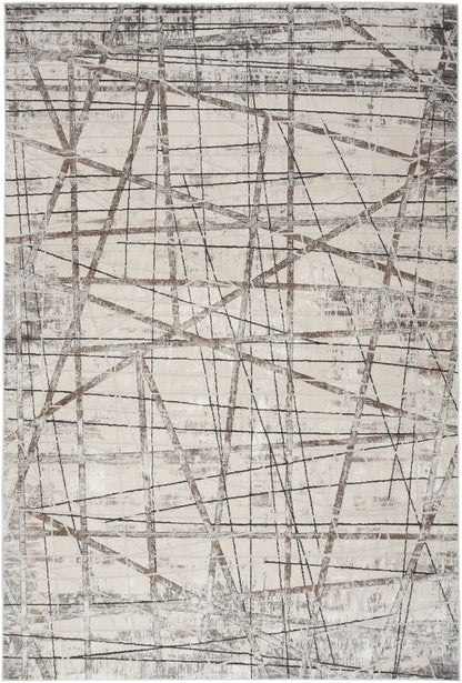 Abstract rug with cream base and taupe-brown crosshatched lines; distressed modern look.