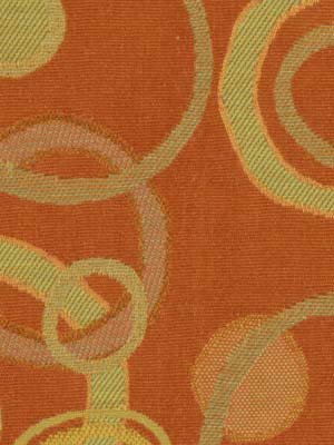 Orange fabric with pale lime-green and yellow circular loop pattern; retro geometric textile for upholstery or crafts.