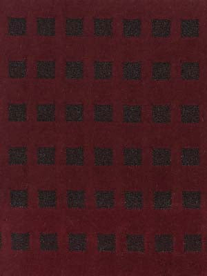 Maroon fabric with a repeating grid of small dark square blocks.