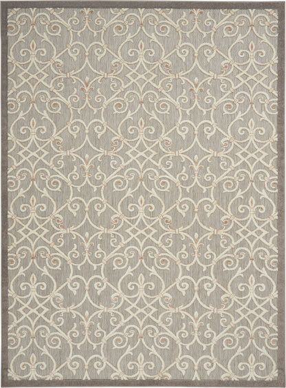 Neutral gray area rug with cream ivory scrollwork and lattice pattern, finished with a darker border.