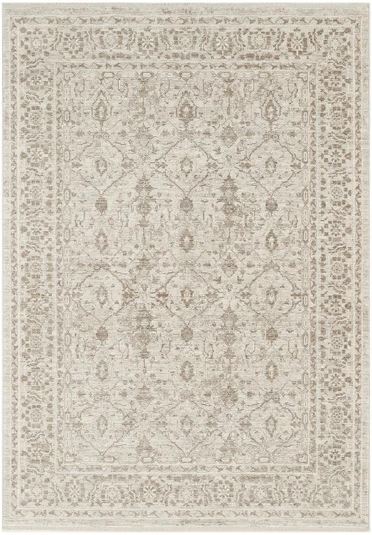 Rectangular beige-toned distressed oriental rug with a soft floral lattice pattern and ornate border.