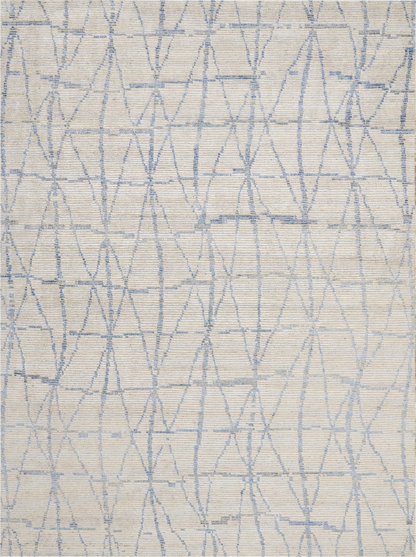 Beige linen-like rug with a pale blue geometric lattice pattern of diamonds and elongated shapes.