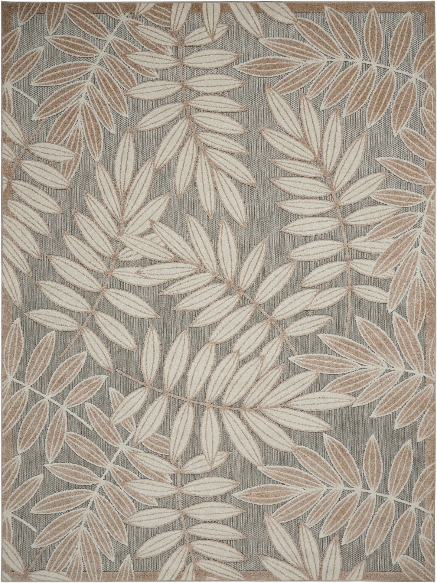 Rectangular woven rug with grey background and beige botanical leaf pattern, neutral coastal-inspired decor