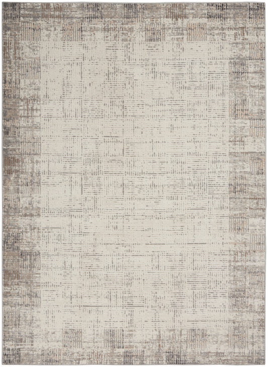 Rectangular beige area rug with a subtle textured grid pattern and a distressed taupe-brown border.
