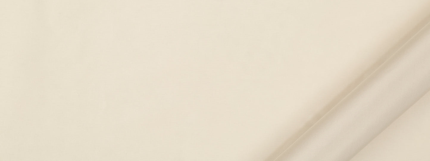 Creme fabric swatch on a warm beige backdrop with subtle texture; multipurpose fabric.