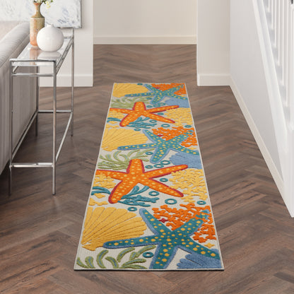 Vibrant beach-motif hallway runner rug with orange & blue starfish, seashells on yellow & aqua background.