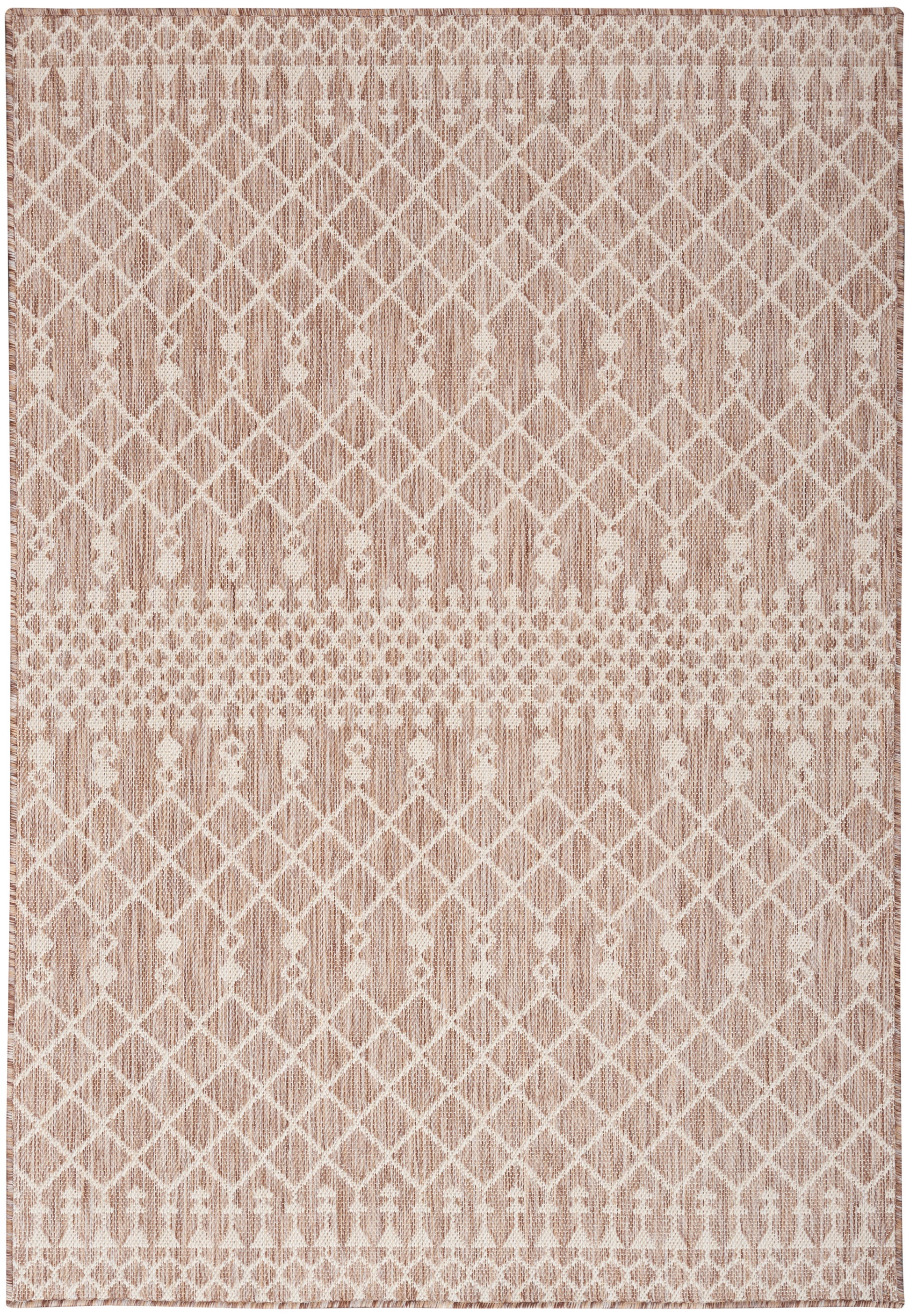 Soft pink textured rug with white lattice diamonds & dotted bands.