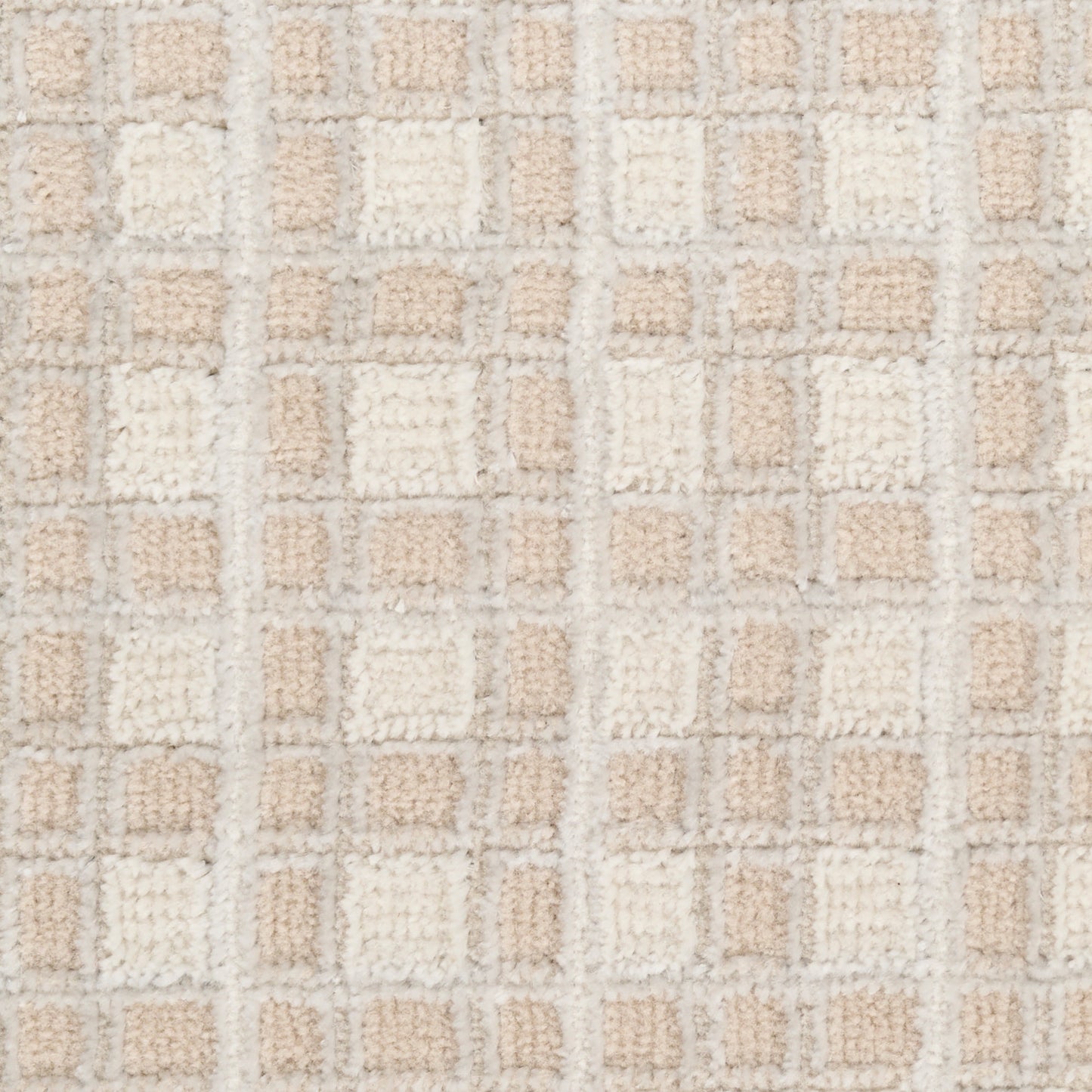 Beige and cream shag rug with a plush grid of square blocks in a modern geometric pattern.