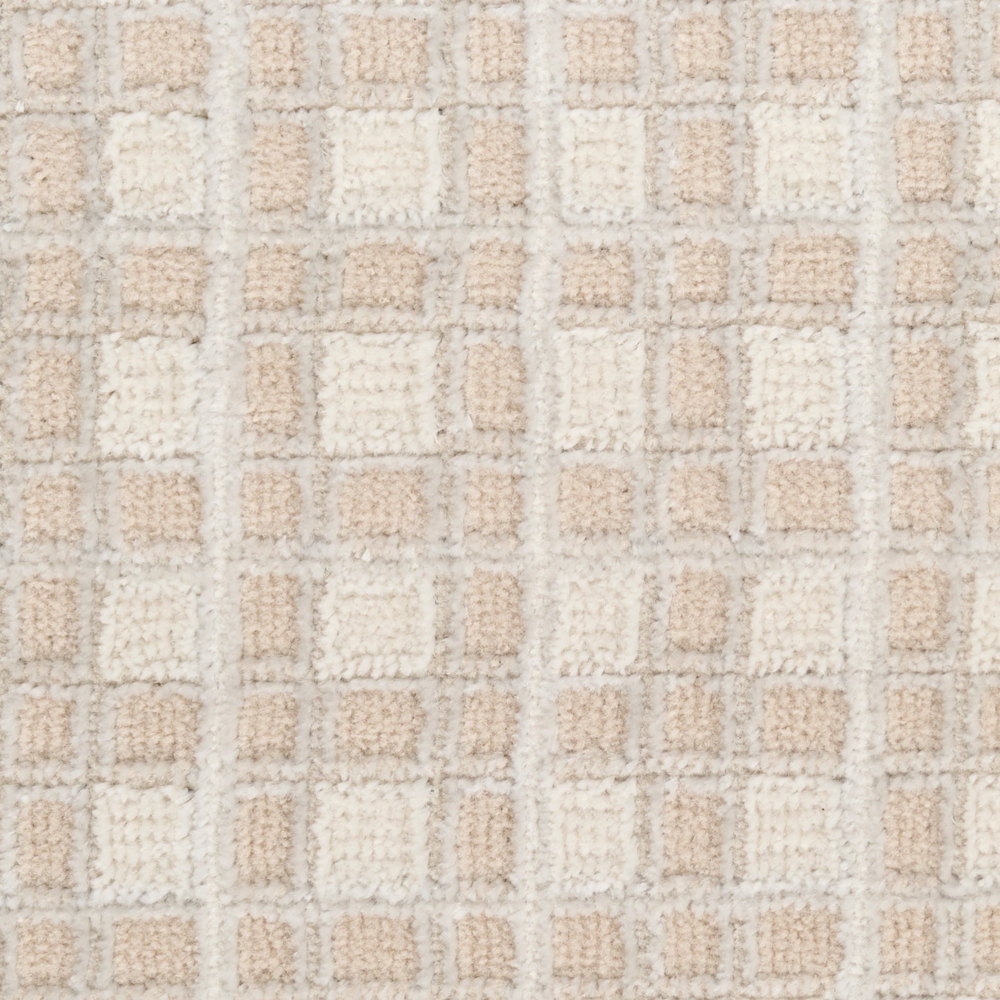 Beige and cream shag rug with a plush grid of square blocks in a modern geometric pattern.