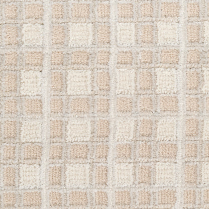 Beige and cream shag rug with a plush grid of square blocks in a modern geometric pattern.
